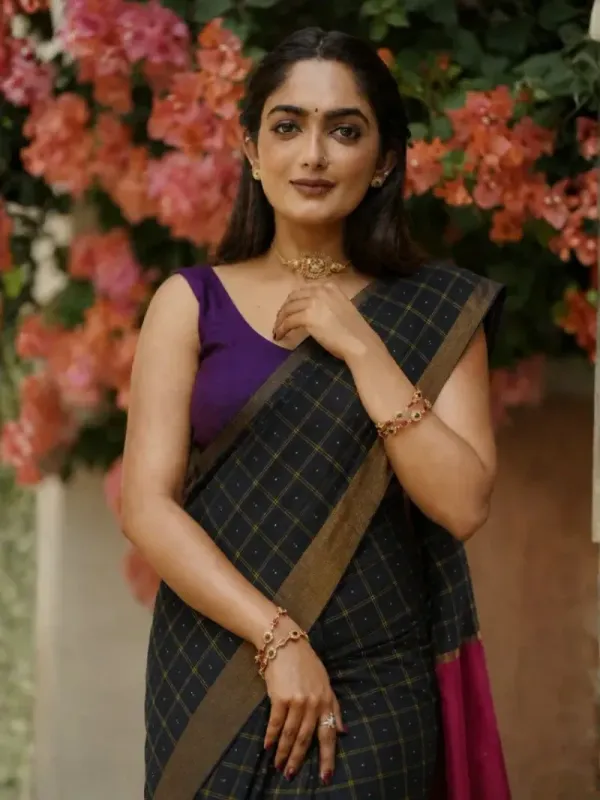 Black with gold and pink border saree